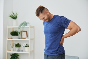 Man backache neck and shoulder pain, inflammation of muscles and ligaments rupture during sports,...
