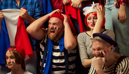 Tense game moment. People, football fans emotionally watching championship,, match of france team....