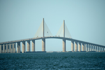 Sunshine Skyway Bridge over Tampa Bay in Florida with moving traffic. Concept of transportation infrastructure