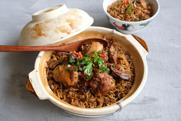 Delicious homemade meals. Claypot Chicken Rice. Healthy fresh ingredients, free range chicken meat, basmati rice, Chinese mushrooms, dried shrimps, black sauce, chili and coriander