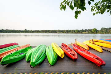 Colorful fiberglass kayak in dock - Powered by Adobe