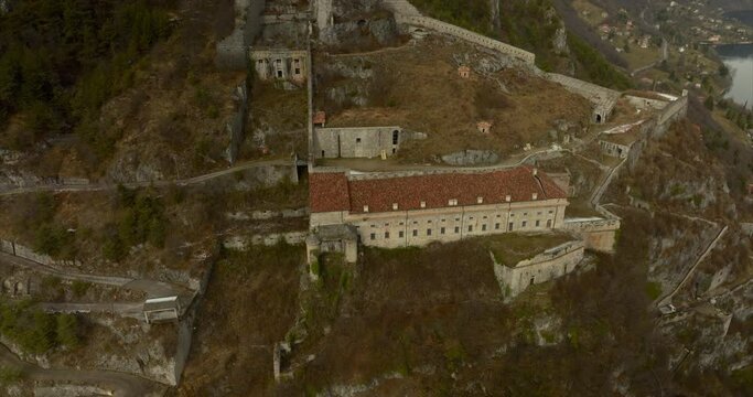 Rocca d'Anfo is a historical military fortification in Anfo adjacent to Lake Idro. Aerial shot of mountains area in Lombardia.
