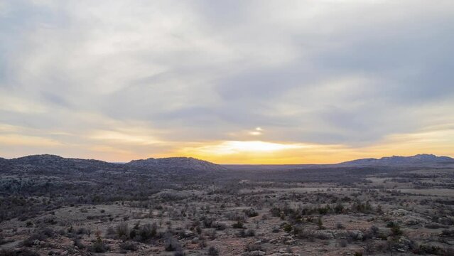High angle sunset time lapse view of Wichita Mountains National Wildlife Refuge
