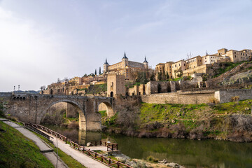 Fototapeta na wymiar Beautiful view of the San Martin Bridge over the Tagus River in Toledo Spain
