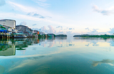 People's houses along the Bang Nara River Narathiwat Province, Thailand.