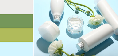 Different cosmetic products and ranunculus flowers on blue background. Different color patterns