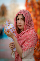 Portrait beautiful or pretty girl with traditional dress culture balloon festival in Thailand