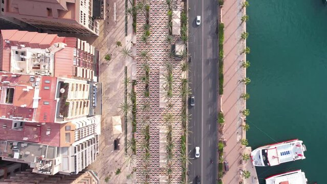 Esplanade Promenade in Alicante Spain. Top Down Aerial View of Mosaic Pavement, Buildings and Coastal Traffic