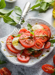caprese salad with pesto sauce