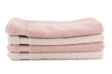 Stack of folded soft towels isolated on white background