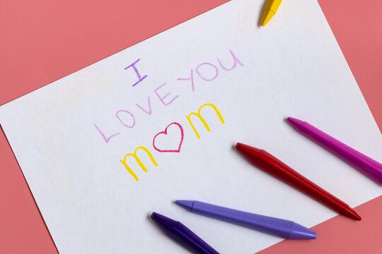 Greeting card for mummy on happy mothers day. Handwritting by kids with love congratulate for mom. Sign I love you mom
