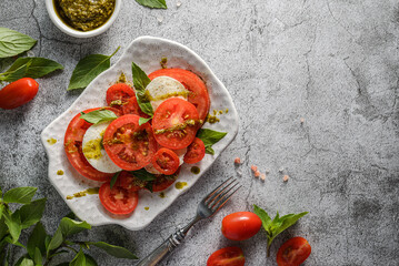 caprese salad with pesto sauce