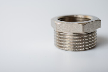 brass metal tee water adapters isolated on light background close up plumbing connections and details