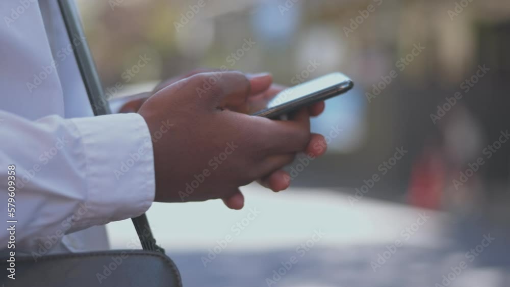 Poster hands, business city and typing on phone, texting or social media on street outdoors. 5g technology,