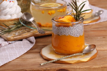 Still life with sea buckthorn tea and chia dessert