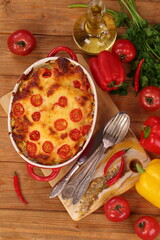 Zucchini baked with tomatoes and cheese
