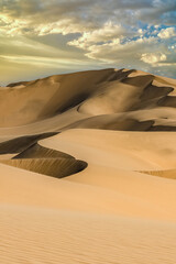 Namibia, the Namib desert, graphic landscape of dunes at sunset
