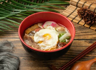 Pot Roast Pasta with egg served in bowl isolated on table top view of taiwan food