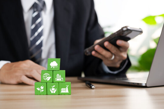 Businessman using computer to manage online information about CO2 concept. Natural environment neutral carbon A climate-neutral long-term strategy greenhouse gas emissions targets.
