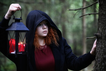 Witch holds a ritual sphere