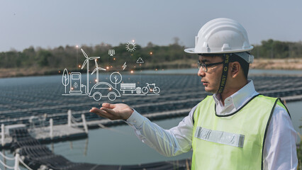 Engineer or Technician man pointing finger or Hand with an icon of energy in front show symbols of various energies with a solar cell in the background, Concepts of clean energy source for renewable. 