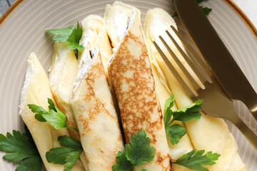 Concept of tasty food, thin pancakes with filling