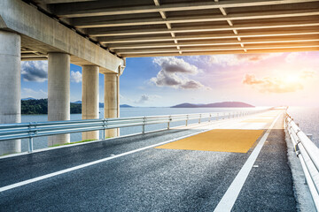 Asphalt road and bridge with sea natural background in Zhoushan, Zhejiang Province, China.