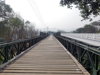 Fototapeta premium Picture of the iron bridge on the Pai River