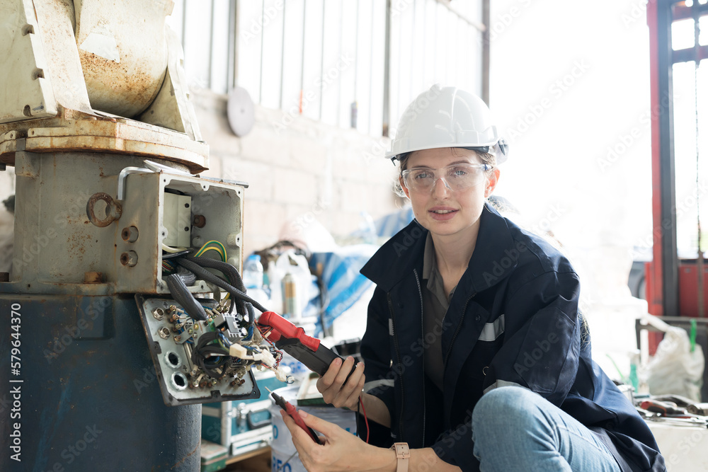 Poster female electrician worker checking, repair, maintenance operation electric system of robotic arm in 