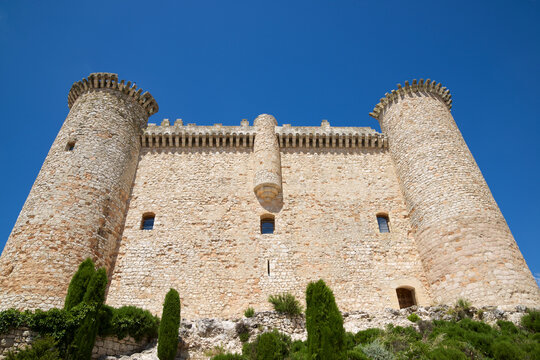 Castle of Torija against clear blue sky during sunny day