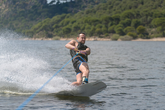 Man wakeboarding in sea