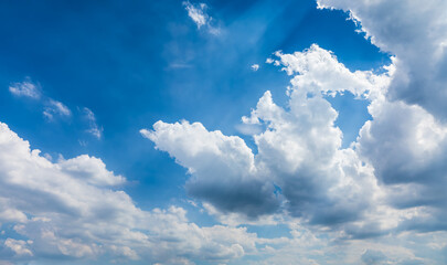 Blue sky and white clouds with sunshine natural background