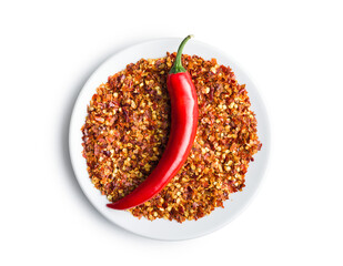 Dry chili pepper flakes. Crushed red peppers and fresh pepper isolated on white background.