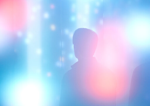 Silhouette of Man in Colorful Abstract Setting