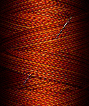 Close up of Needle and Thread Red Orange Yellow