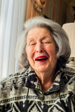Portrait of a grandma laughing