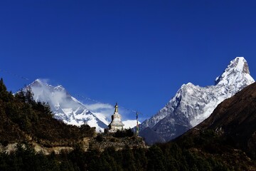 A Buddhist Stupa with Mt. Everest, Mt. Lhotse and Mt. Ama Dablam.
