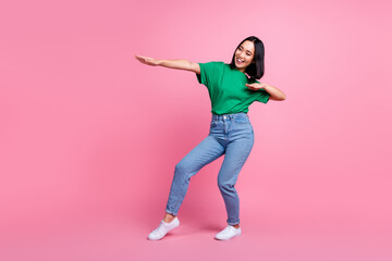 Full body portrait of cheerful carefree lady have fun dancing chilling isolated on pink color background