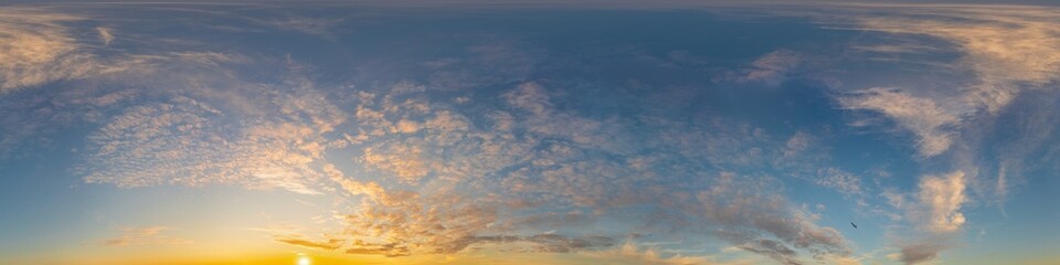 Dark blue sunset sky panorama with golden Cirrus clouds. Seamless hdr 360 panorama in spherical...