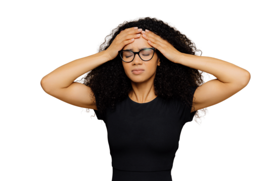 Image of beautiful woman feels unwell, touches forehead, suffers from headache, closes eyes from pain, being overworked, wears transparent glasses and casual t shirt, isolated over brown background - Powered by Adobe