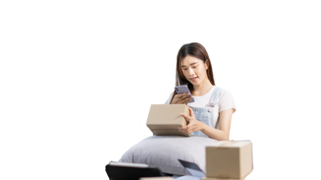 Woman taking a photo of product in box postbox with a mobile phone, Identity verification or order confirmation, Business style for working at home, Working at home and owning businesses.