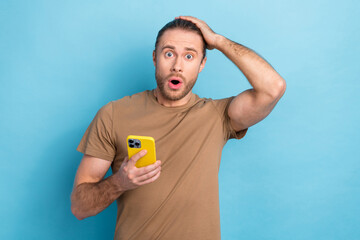 Photo of young funny entrepreneur hand head confused forgot his password twitter account hold...