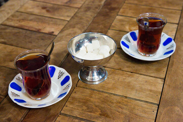 Traditional glass cups for drinking tea in the Grand Bazaar, the old traditional market in Istanbul (Turkey)