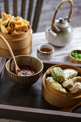 siomay and batagor is Indonesian traditional food, steamed and fried dumpling with peanut sauce