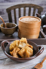 batagor is Indonesian dish like fried dumplings, served in peanut sauce and chili