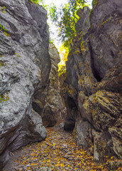 Gola dell'Infernaccio (Italy) - Gole dell'Infernaccio canyon and Eremo di San Leonardo sanctuary, in the Monti Sibillini National Park, Marche region, here with autumn foliage