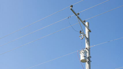 street support of high-voltage wires with transformer box, cable lines, electricity,