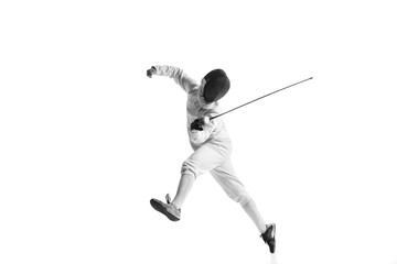 Professional male fencer in fencing costume training with sword isolated on white studio background. Concept of sport, competition, professional skills, achievements