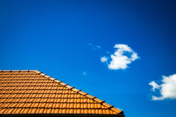 new red tiles roof and blue sky