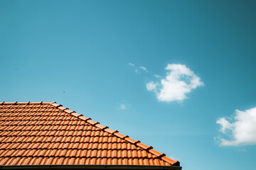 new red tiles roof and blue sky